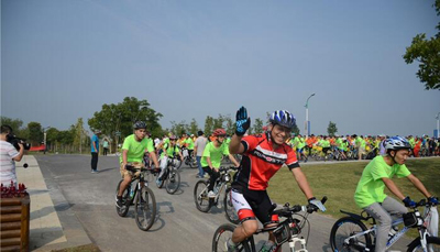 1474854360418263.jpg 镇江句容体彩全程助力“2016年世界无车日骑行体验赤山湿地活动” (7).jpg