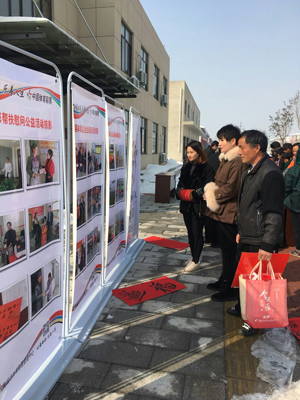 1517817909332996.jpg 3、墨香飘溢暖人心 镇江句容体彩开展“送春联下乡”活动照片.jpg