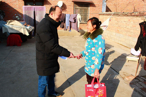 1612683631592666.jpg 宿迁体彩党支部进村入户1_副本.jpg